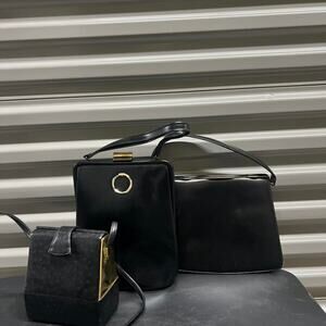 Bundle of three vintage black and gold bags